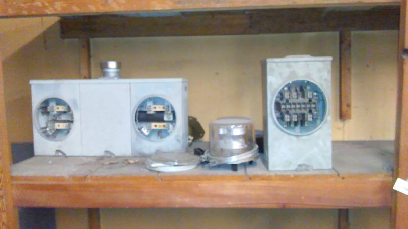 lot 729 image: Circular Electric Meters with globes and boxes