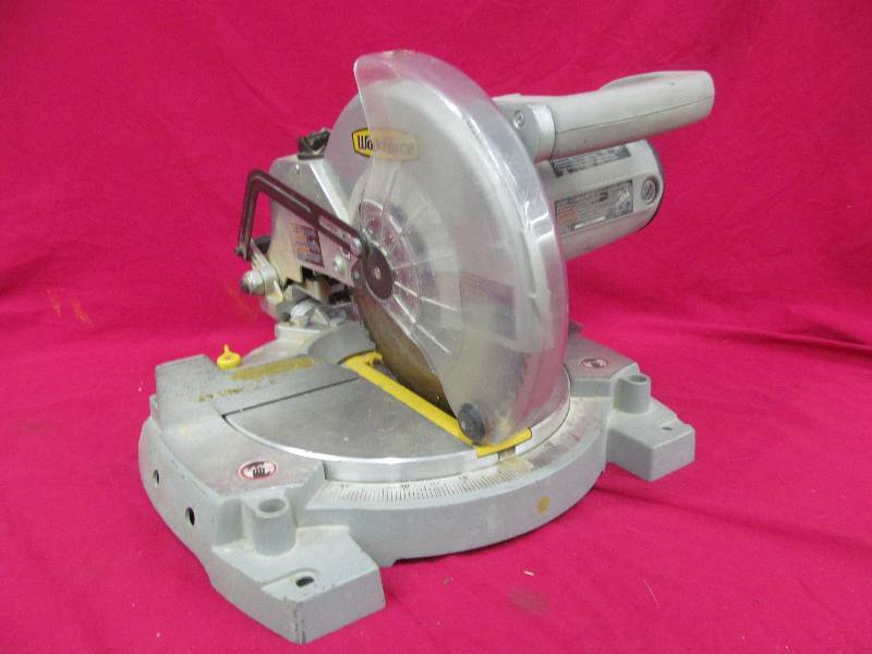 lot 28 image: Work Force compound miter saw
