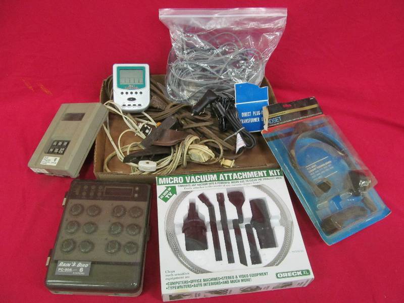 lot 92 image: door stops, extension cords, vac attachment