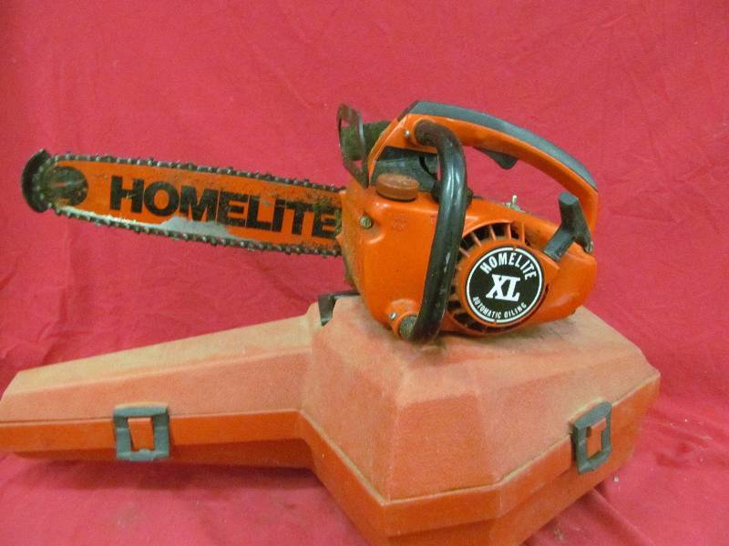 lot 117 image: Homelite chain saw