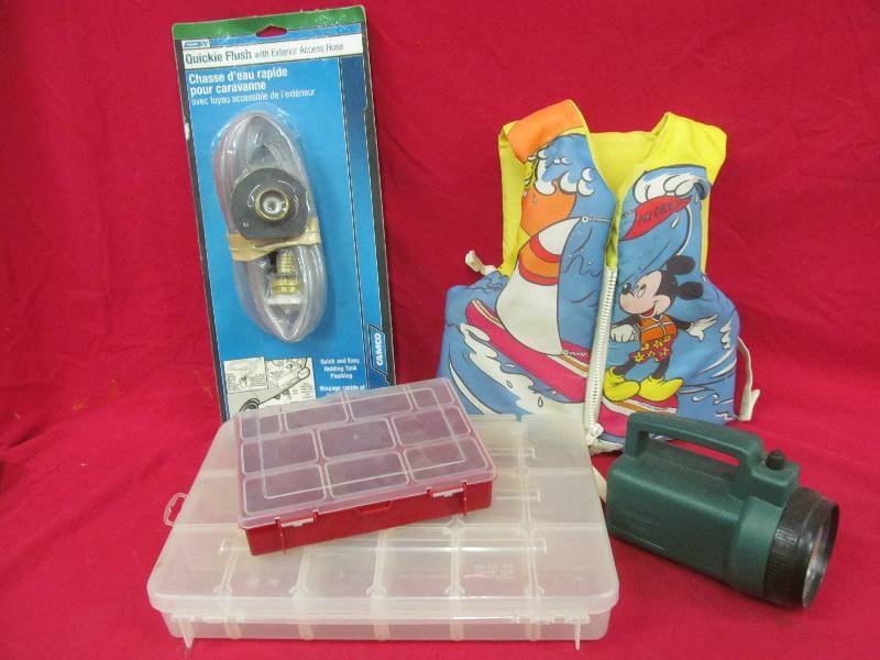 lot 172 image: Quick flush access hose. Life vest. Flashlight