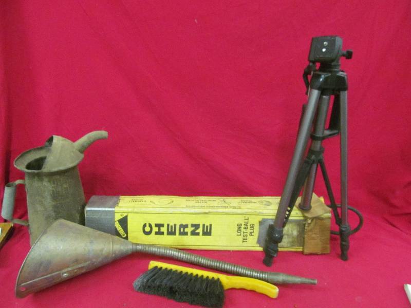 lot 176 image: vintage oil can, oil can funnel, camera tripod, test ball