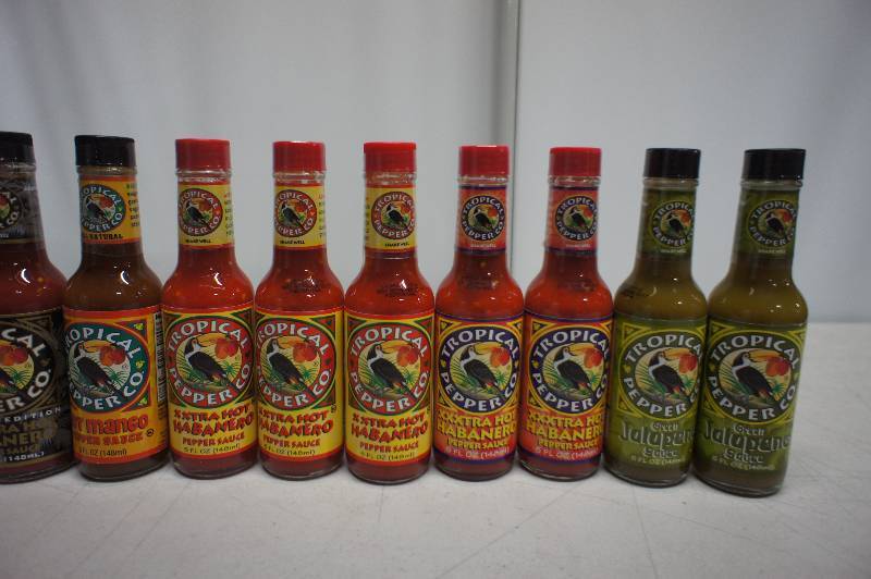 lot 150 image: Lot of 15 Bottles of Assorted Hot Sauces - All Items Are In Date -