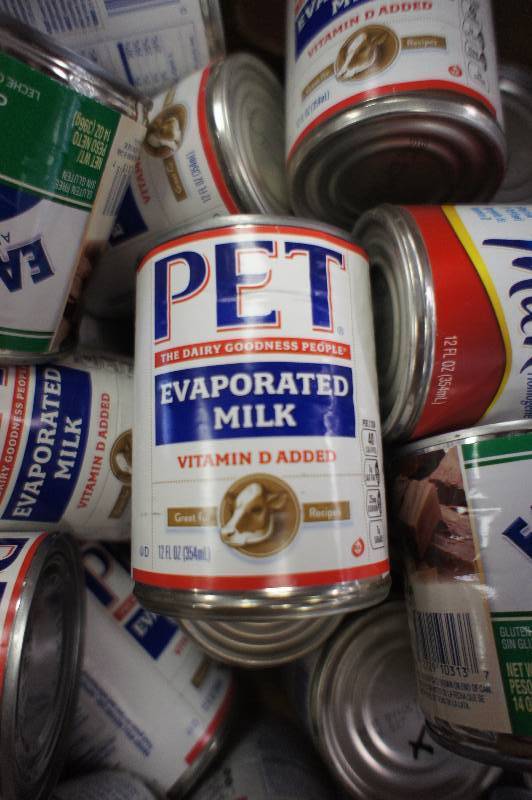 lot 172 image: Lot of 45 Cans of Evaporated Milk - All Items Expired In 2016 -