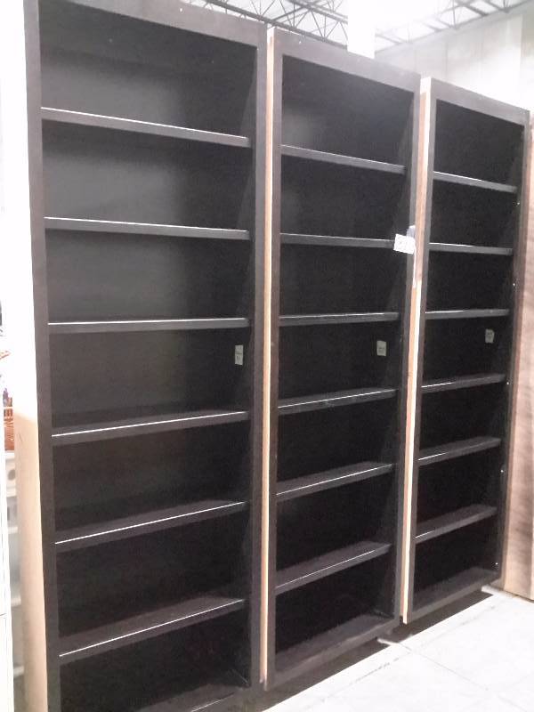 3 very tall book shelves.. Excellent shape