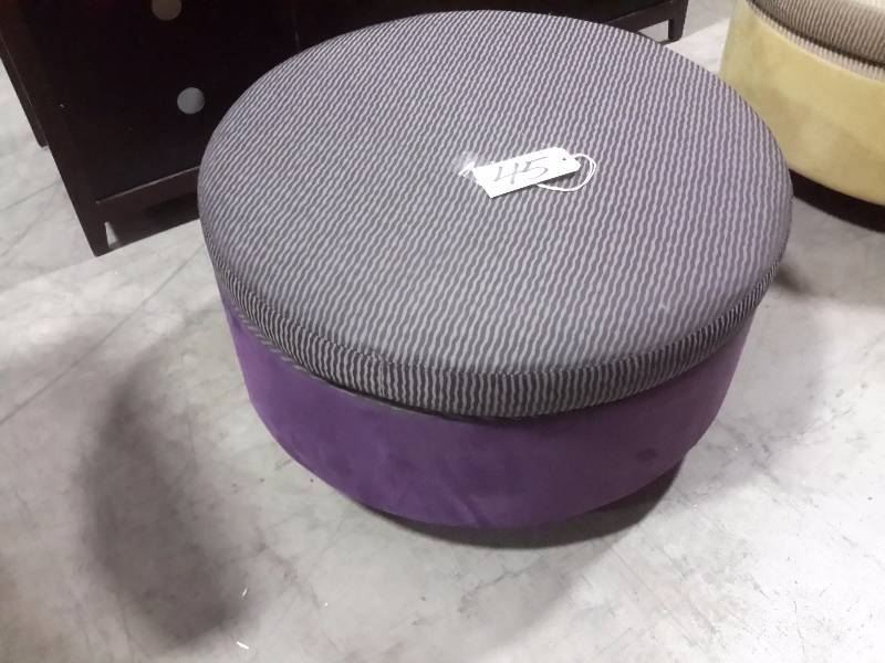 Very nice upholstered Round ottoman..