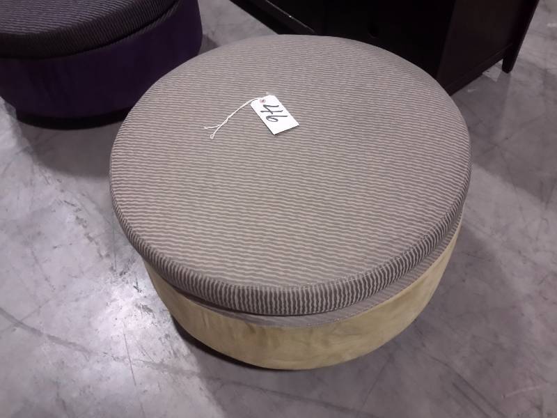 Very nice upholstered Round ottoman..