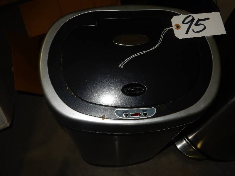 2 Stainless Waste Baskets. One is electronic openclose.. Not batteries so couldn�t test.