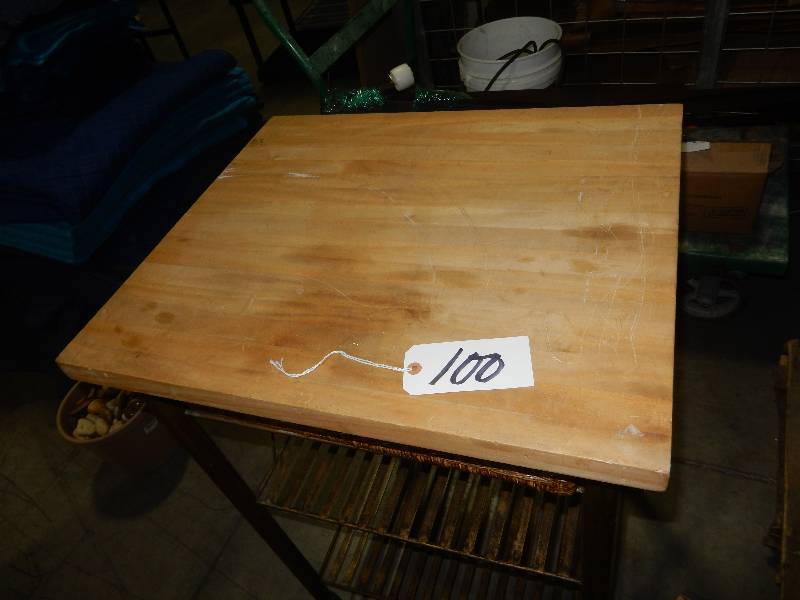 Nice butcher block utility table with Wicker Basket drawer.