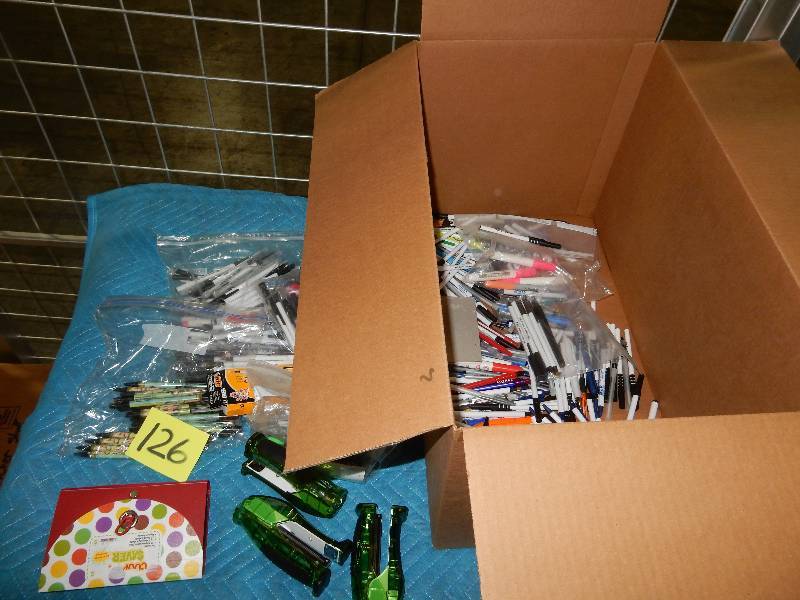lot 126 image: PENS, PENS, and More Pens.. Oh yeah.. 3 staplers