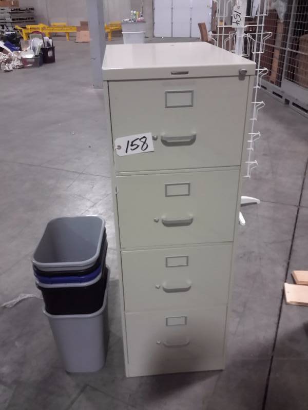lot 157 image: 4 drawer, legal size file cabinet.  STEELCASE.. Fully extending drawers.. 4 waste baskets.