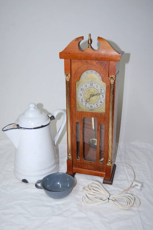lot 87 image: Clock and Vintage Pot