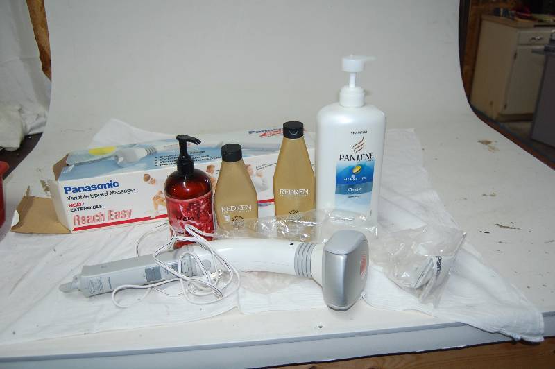 lot 256 image: Massager and Hair Products