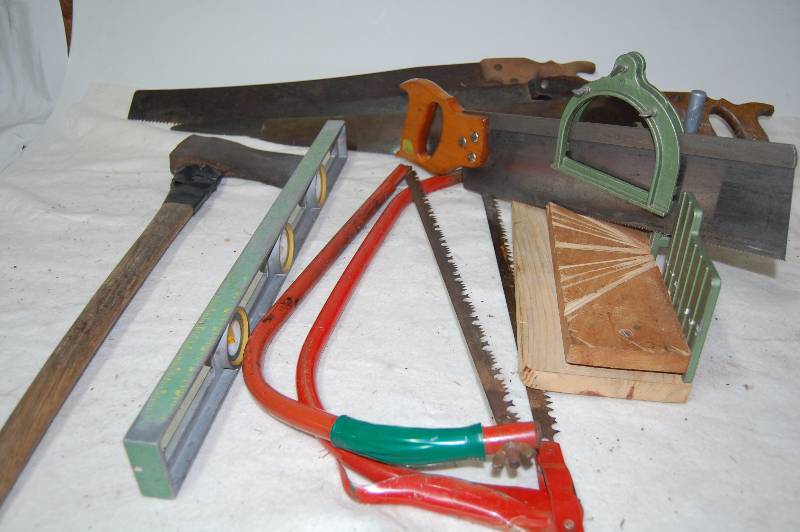 lot 392 image: Hand Saws, Level,  and Axe