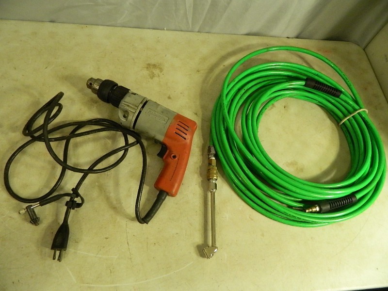 lot 37 image: Milwaukee Hammer Drill and Air Hose