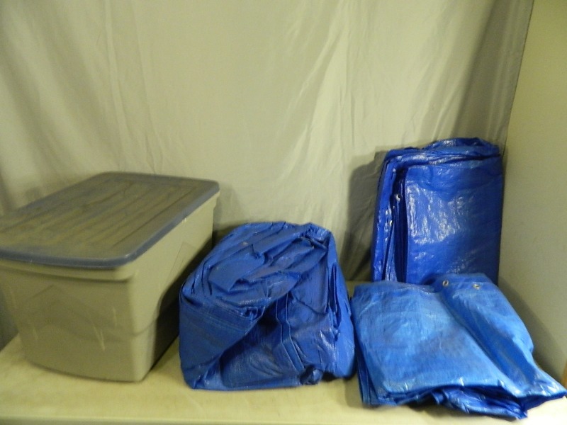 lot 44 image: Tote with Lid Full of Tarps