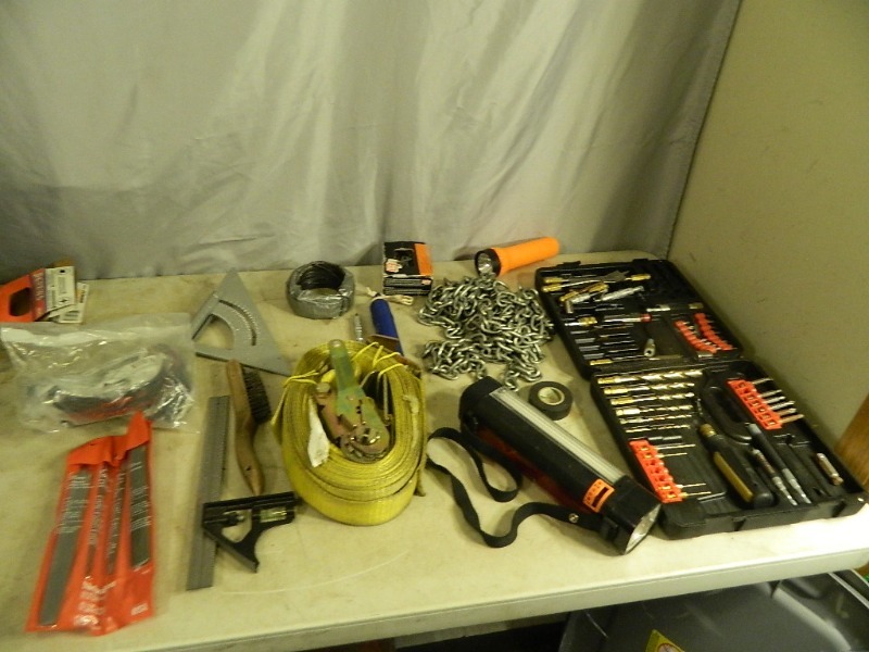 lot 75 image: Drill Bits, Ratchet Strap, Tools, Etc