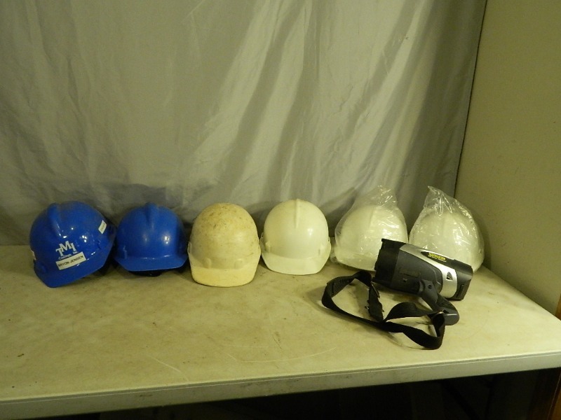 lot 125 image: 6 Hard Hats and Stanley Spotlight