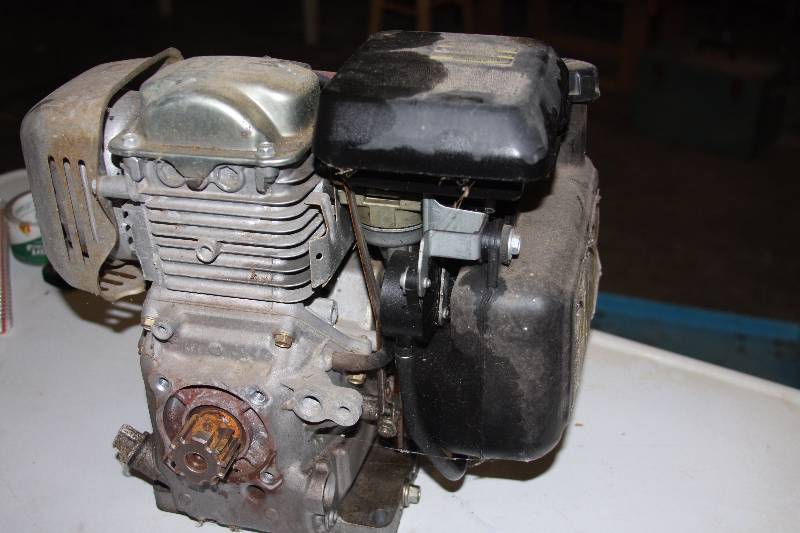lot 14 image: Honda 5 HP gas motor.