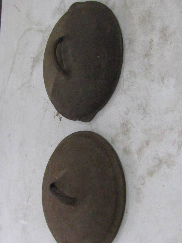 lot 14 image: Cast Iron Lids