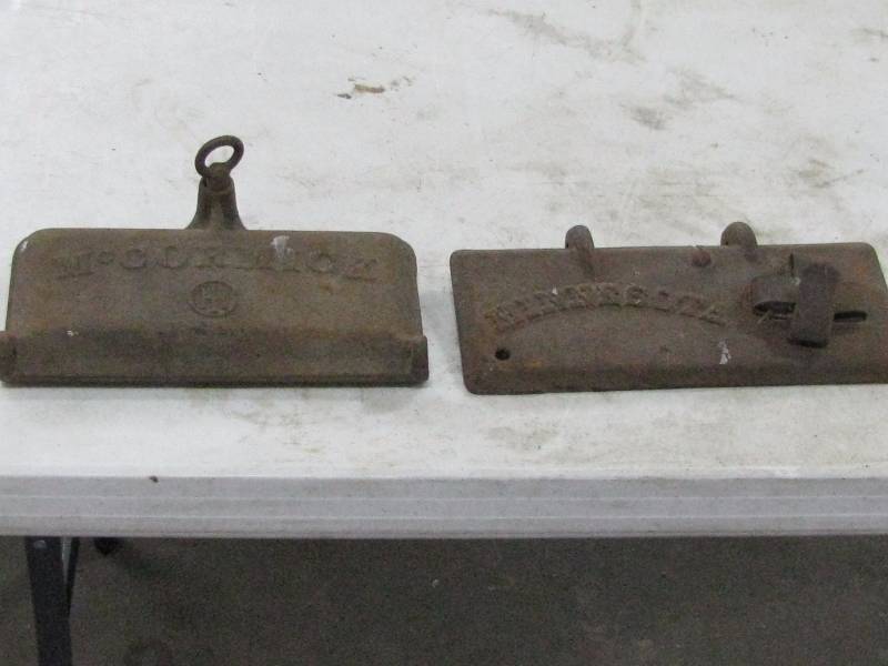lot 15 image: Cast Iron Implement Lids