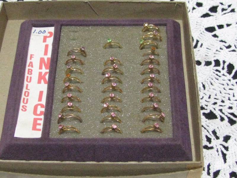 lot 42 image: Box of Pink Ice Childrens Rings