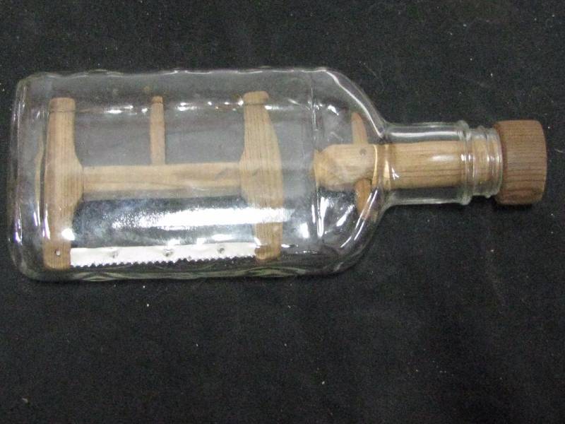 lot 55 image: Saw in a Bottle