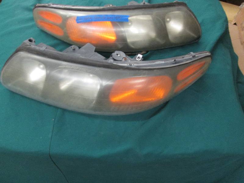 Pair of Pontiac Bonneville Headligh...