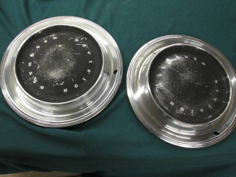 2 Plymouth Hubcaps...