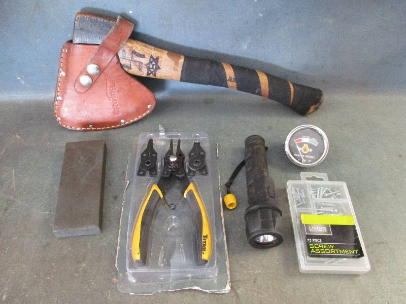 lot 104 image: Hatchet and flashlight