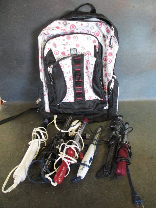 lot 121 image: Girls Backpack and Curling Irons