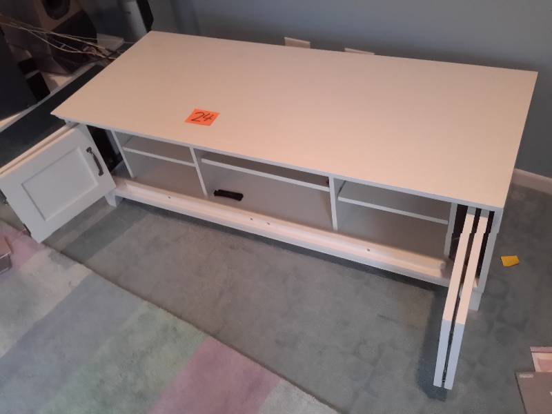 lot 24 image: Low stature entertainment center with bottom cabinet