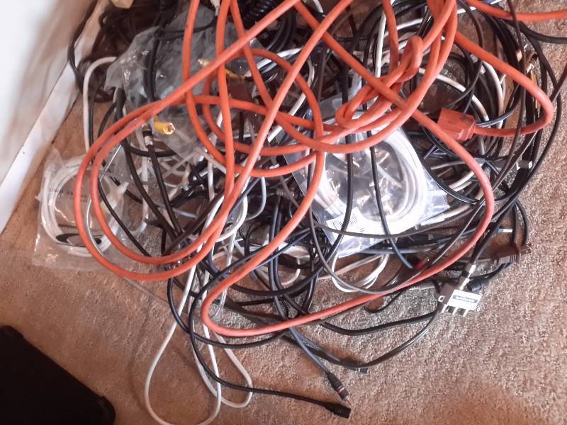 lot 77 image: Large lot of cords.. Take it all away.. Includes a couple of trouble lights