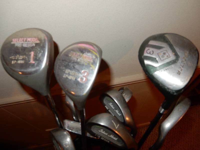 lot 87 image: Set of SELECT MODEL Golf Clubs. See pictures for numbers.. Bag included