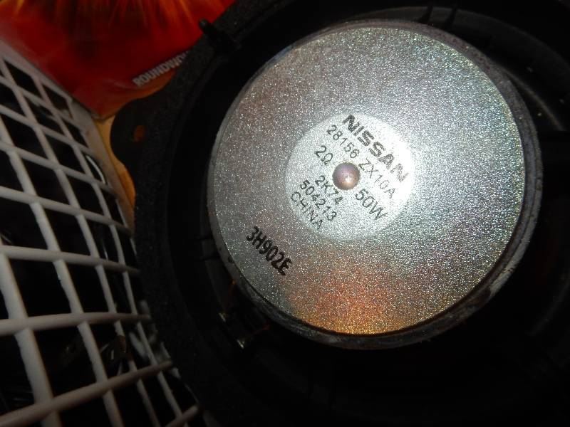 lot 112 image: 4 car speakers and misc. Cords.. 2 Nissan, 2 Blaupunkt.. Untested