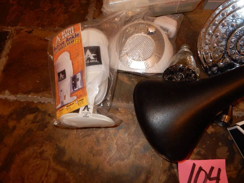 lot 104 image: Misc. items as pictured.. Includes Heat gun, bike seat, first aid kit and more.. See closeups