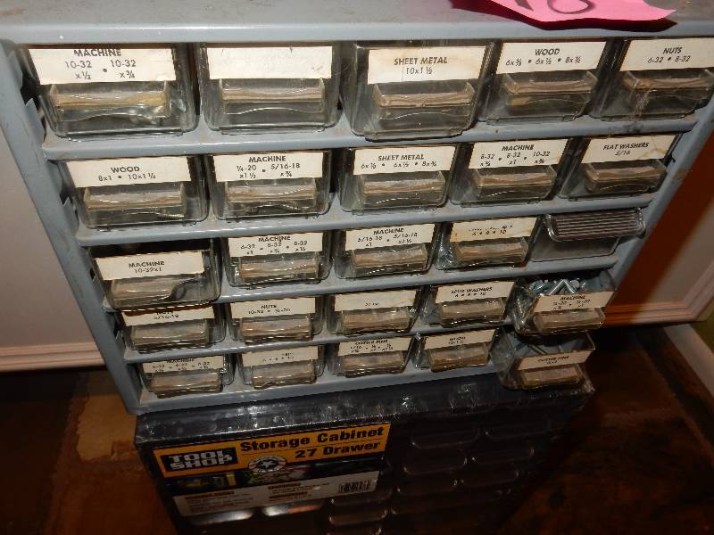 lot 118 image: 2, small drawer cabinets as shown. 1 new  1 with the contents.