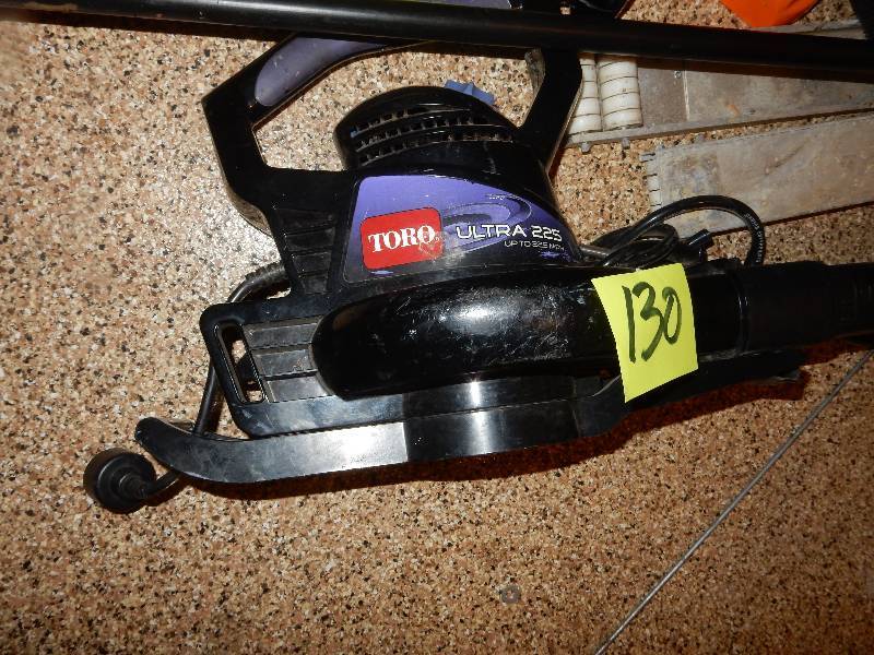 lot 130 image: Toro Electric Blower.. Sprinklers and other lawn items as pictured