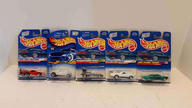 lot 98 image: Lot of (5) Matchbox 164th Scale Cars- See Pictures for Descriptions, Series and Styles