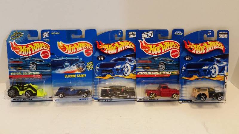 lot 92 image: Lot of (5) Matchbox 164th Scale Cars- See Pictures for Descriptions, Series and Styles