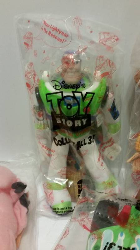 lot 102 image: Toy Story Lot of Stuffed Toys - Woody, Buzz Lightyear, Hamm, Rex - Collect them all