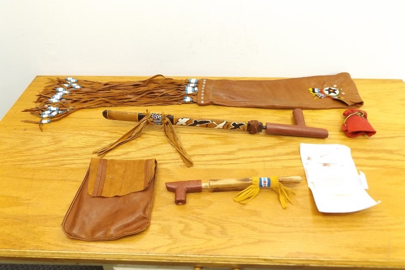 lot 26 image: 2 Authentic Native American Pipestone Pipes in Leather Sheathes