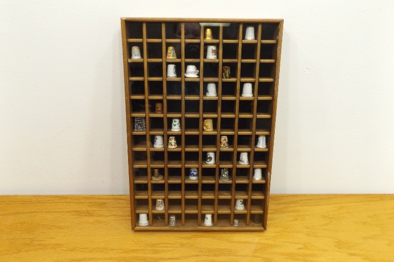 lot 34 image: Wood Thimble Shadow Box and Thimble Collection