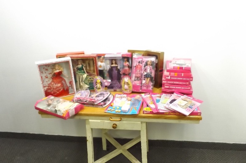 lot 45 image: MASSIVE Lot of New In Box Vintage Barbie Dolls and Accessories