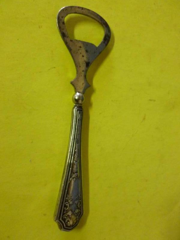 lot 217 image: Sterling Bottle Opener