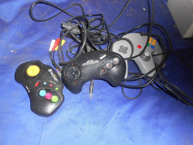 NINTENDO , GENASIS AND STRIKER CONTROLERS