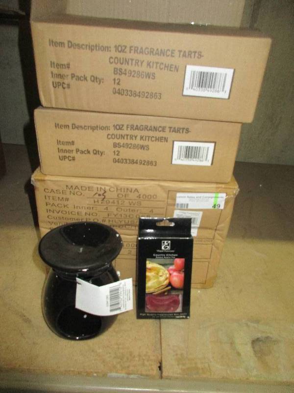 lot 49 image: 3 wax burners and 2 cases of wax