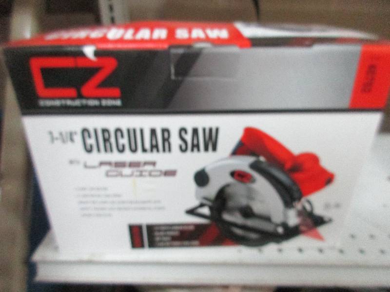 lot 62 image: 7.25 circular saw w laser guide