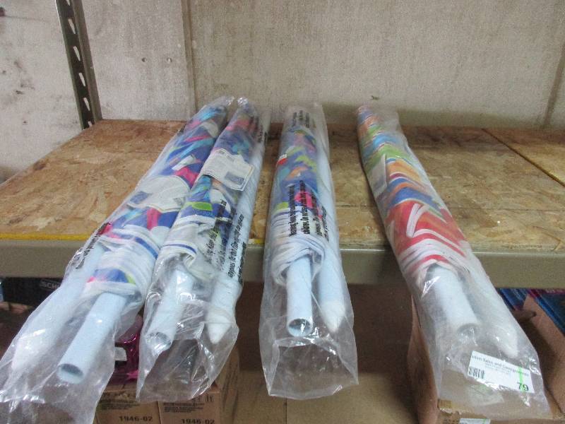 lot 79 image: 4 printed sun umbrellas
