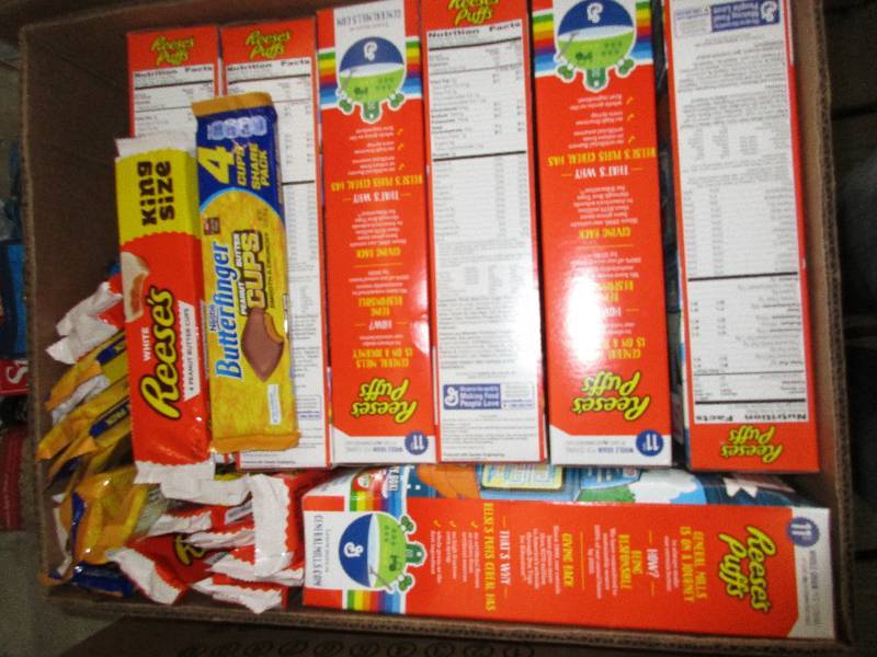 lot 108 image: 8 boxes reeses puffs 20 reeses white cups and butterfingers cups - expired